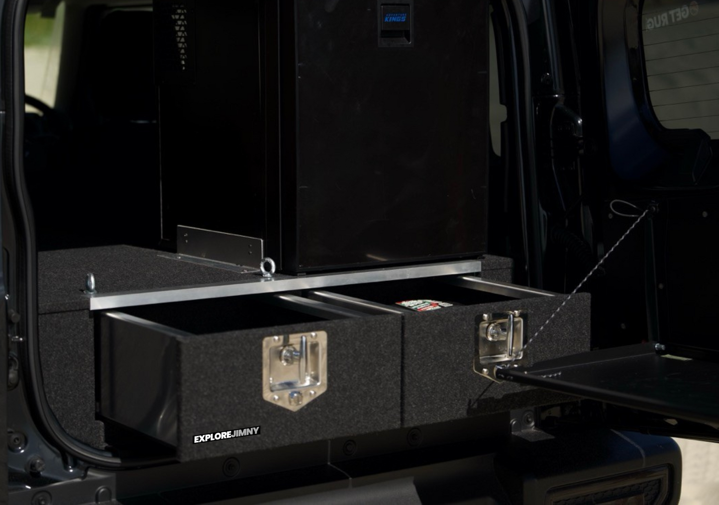 EXPLOREJIMNY jimny xl drawer system installed in vehicle with two open storage drawers