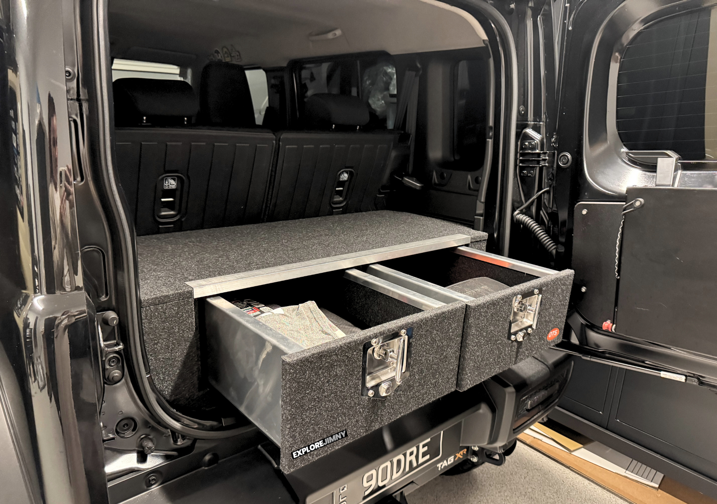 EXPLOREJIMNY jimny xl drawer system installed with two open drawers for storage
