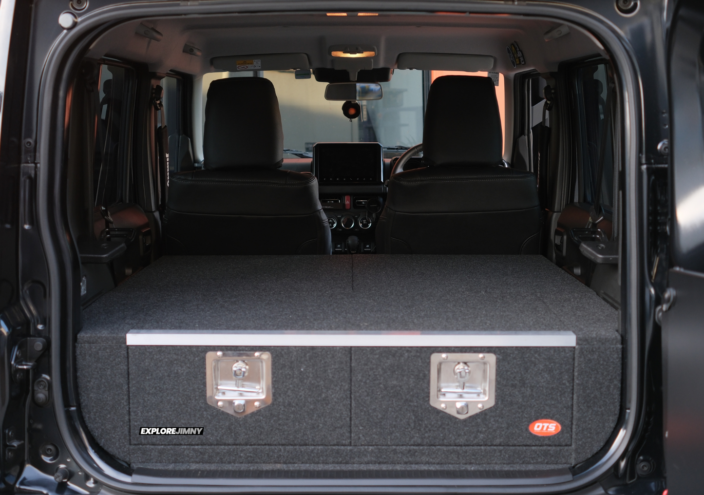 Explorejimny jimny xl drawer system installed in rear cargo area of Suzuki Jimny with black interior